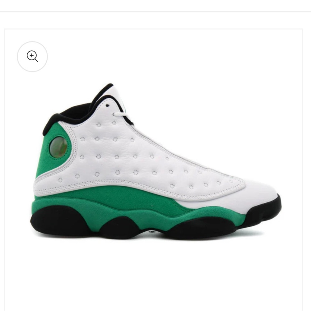 NWT - The Jordan 13 Lucky Green features a white leather upper with green suede.